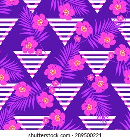 Fashion seamless nature exotic pattern with tropical palm leaves and flowers.Modern Jungle summer floral ornament on violet background wallpapers.