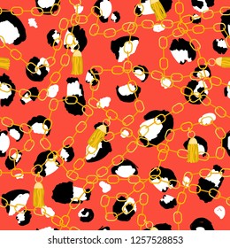 Fashion seamless pattern with gold chains and tassels on coral leopard skin. Vector hand drawn illustration.