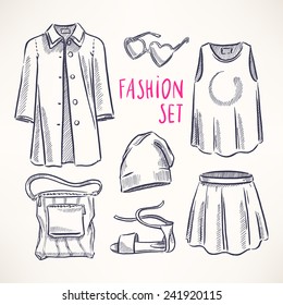 fashion set with women's clothing and accessories. hand-drawn illustration