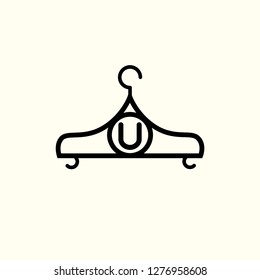 Fashion vector logo. Clothes hanger logo. Letter U logo. Tailor emblem. Wardrobe icon - Vector