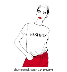 Fashion woman sketch. Hand drawn beautiful young woman with red lips in black t shirt with inscription fashion, red jeans. Fashion model posing. Vector illustration. Fashion, style, beauty, sketch