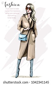 Fashion woman in stylish coat. Beautiful young woman with bag. Elegant girl in fashion clothes. Sketch.