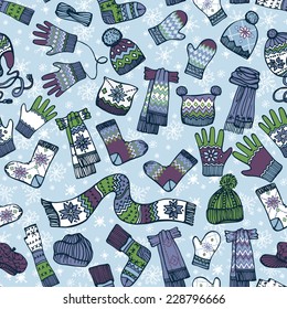 Fashionable female knitted accessories seamless pattern on Sketchy style with snowflakes.Winter  wear.Mittens,gloves,stockings,socks,hats, scarf.Backdrop,background,fabric,Wallpaper.Fashion Vector.