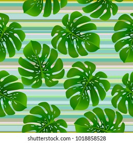 Fashionable floral jungle ornament with monstera leaf tropical seamless pattern vector.