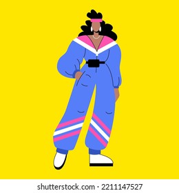 A Fashionable Girl In A Bright Jumpsuit In The Style Of The 90s Or 80s. Stylish Woman In Retro Sportswear