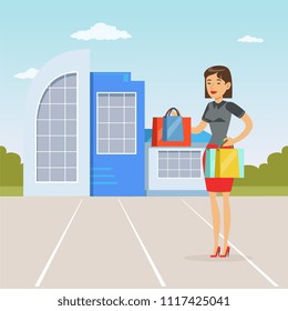 Fashionable girl standing in front of shopping mall with purchases, people shopping concept vector Illustration
