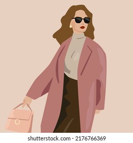 Fashionable lady woman in coats with sunglasses and earrings. Fashionable look for autumn spring. A business woman holds a bag, an image for a walk or to the office. Beautiful style in clothes