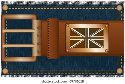 Fashionable leather belt with a copper label and a flag against a jeans fabric