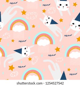 Fashionable seamless pattern with funny kitty and rainbow. For printing on children's clothes. Hand-drawn.
