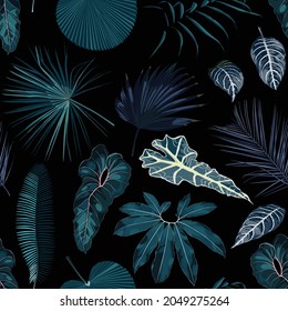 Fashionable seamless tropical pattern with blue tropical exotic leaves on a black background. Beautiful exotic plants. Trendy summer Hawaii print. 