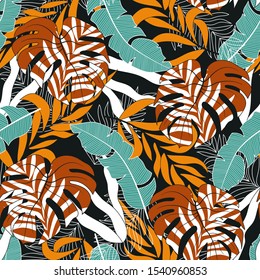 Fashionable seamless tropical pattern with bright blue and orange plants and leaves on dark background. Summer colorful hawaiian seamless pattern with tropical plants. Printing and textiles. 