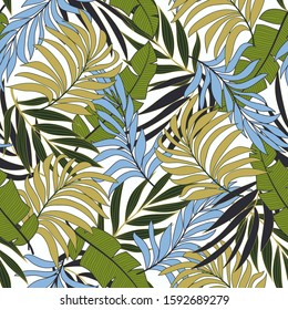 Fashionable seamless tropical pattern with bright blue and yellow plants and leaves on a light background. Modern abstract design for fabric, paper, interior decor. Tropic leaves in bright colors.