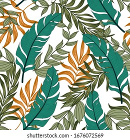 Fashionable seamless tropical pattern with bright plants and leaves on a white background. Hawaiian style. Seamless exotic pattern with tropical plants. 
Vintage pattern.