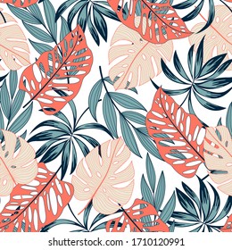 Fashionable seamless tropical pattern with bright plants and leaves on a delicate background. Beautiful exotic plants. Trendy summer Hawaii print. Colorful stylish floral.