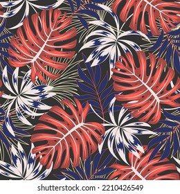 Fashionable seamless tropical pattern with bright plants and leaves on a gray background. Beautiful exotic plants. Summer colorful hawaiian seamless pattern with tropical plants. 