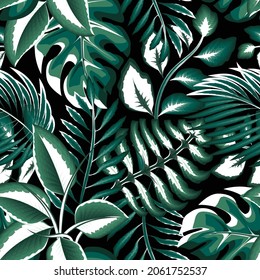 Patrón tropical de moda sin fisuras con plantas de luz y hojas en un fondo nocturno. color verde y blanco combinando palmeras y hojas tropicales de helecho. Papel tapiz de la jungla exótica