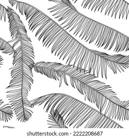 Fashionable seamless tropical pattern with palm silhouette, tropical leaves on a black background. Beautiful exotic plants. Trendy summer Hawaii print. 