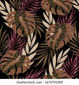 Fashionable seamless tropical pattern with plants and leaves on a brown background. Summer colorful hawaiian seamless pattern with tropical plants.