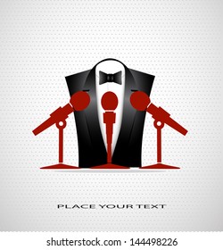 fashionable suit before a microphone on a seamless background with a place for your text