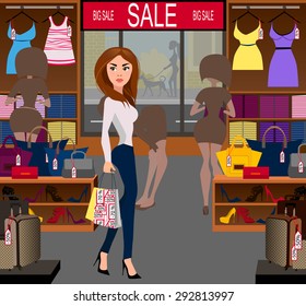 Fashionable woman with purchases on a big sale in the shop