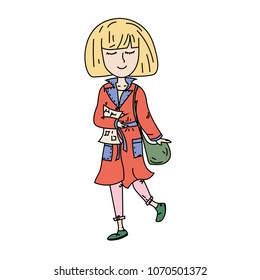 A fashionable young girl is walking down the street of a big city