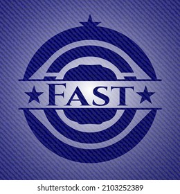 Fast emblem with jean background. Vector Illustration. Detailed. 