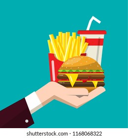 Fast Food in Human Hand. Vector Flat Design Illustration of Hamburger Sandwich with Soda Drink and French Fries.