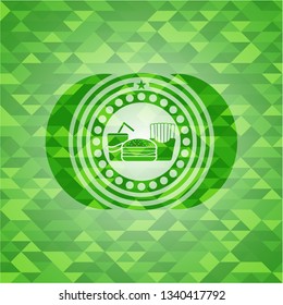 fast food icon inside realistic green mosaic emblem