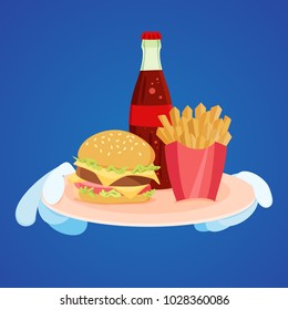 Fast food on tray. Hands holding a plate with burger, fries and cola.