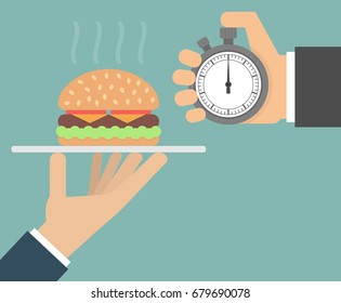 Fast food service concept. Hand holding stopwatch and a fresh hamburger on a serving tray