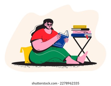 A fat girl is reading a book. A student is sitting on the floor with a book. Library, bookstore. Literature