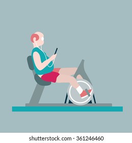 fat guy exercise with cycling gym while using smart phone.