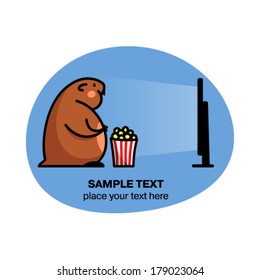 Fat hamster watching tv