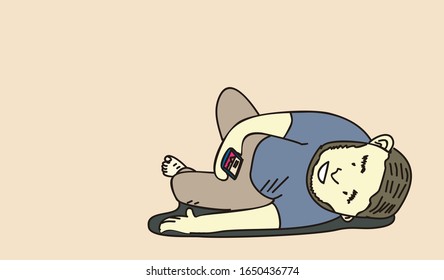 Fat man lie down on the floor while  watching smartphone