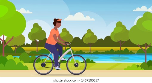 Fat Obese Woman Riding Bike African American Overweight Girl Cycling Bicycle Workout Weight Loss Concept Summer Park Landscape Background Flat Full Length Horizontal Vector Illustration