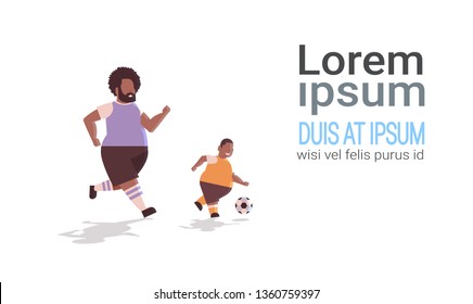 fat overweight father with obese son playing football over size family having fun child and dad in sportswear weight loss activity concept horizontal copy space white background full length