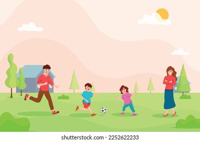 Father and children playing football together,mother standing beside,family hobby,relax time,on green lawn