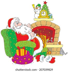 Father Christmas sitting in a chair beside a fireplace