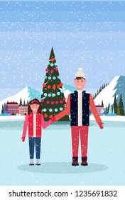 father and daughter skaters standing ice rink decorated christmas tree 
