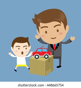 Father giving toy car to his son
