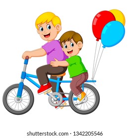 Father with happy kid riding a bike