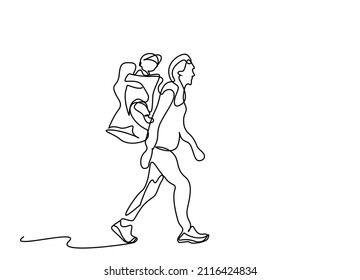 father hiking and exploring nature with kid in backpack. vacation family carrying their children in a backpack