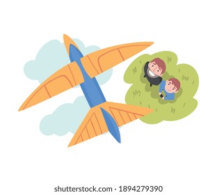 Father and his Son Launching Airplane Model, Happy Parent and Child Spending Time Together Outdoors Cartoon Style Vector Illustration