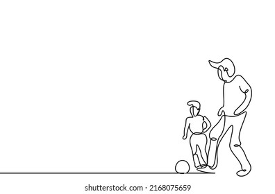 a father and his son playing ball together happily outside