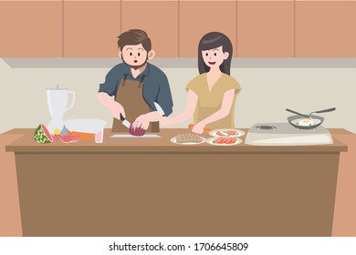 Father is learning cooking from mother in the kitchen