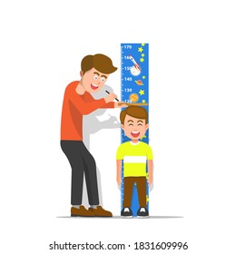 A father measures the height of his son 