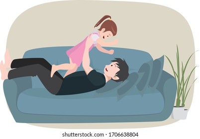 Father is playing with his daughter in living room