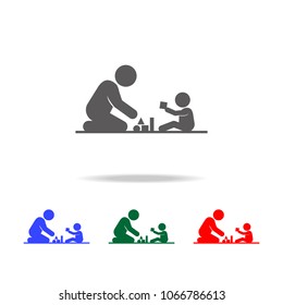 father playing on the floor with a child icon. Elements of family multi colored icons. Premium quality graphic design icon on white background