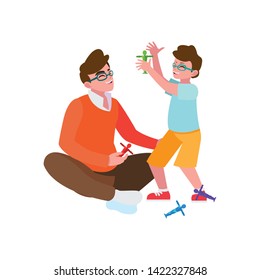 father playing with son characters