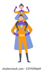 Father and som playing superheroes, dressed in super hero costumes.